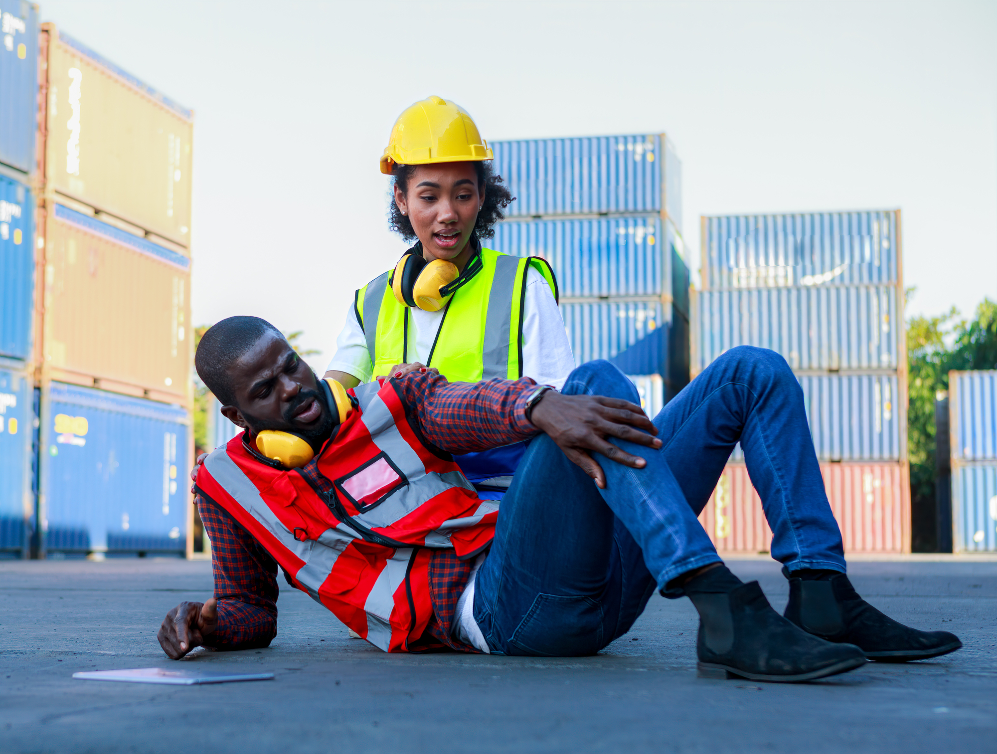 Shipping & Receiving Injuries & Getting Legal Help - African-American male and female engineers injured the accident